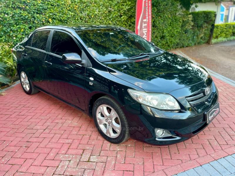 TOYOTA - COROLLA - 2010/2011 - Preta - R$ 56.900,00