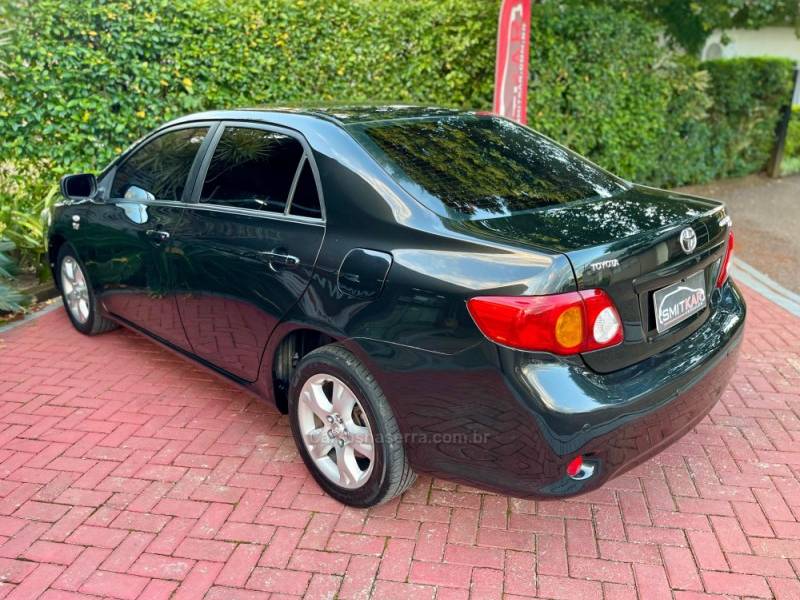 TOYOTA - COROLLA - 2010/2011 - Preta - R$ 56.900,00